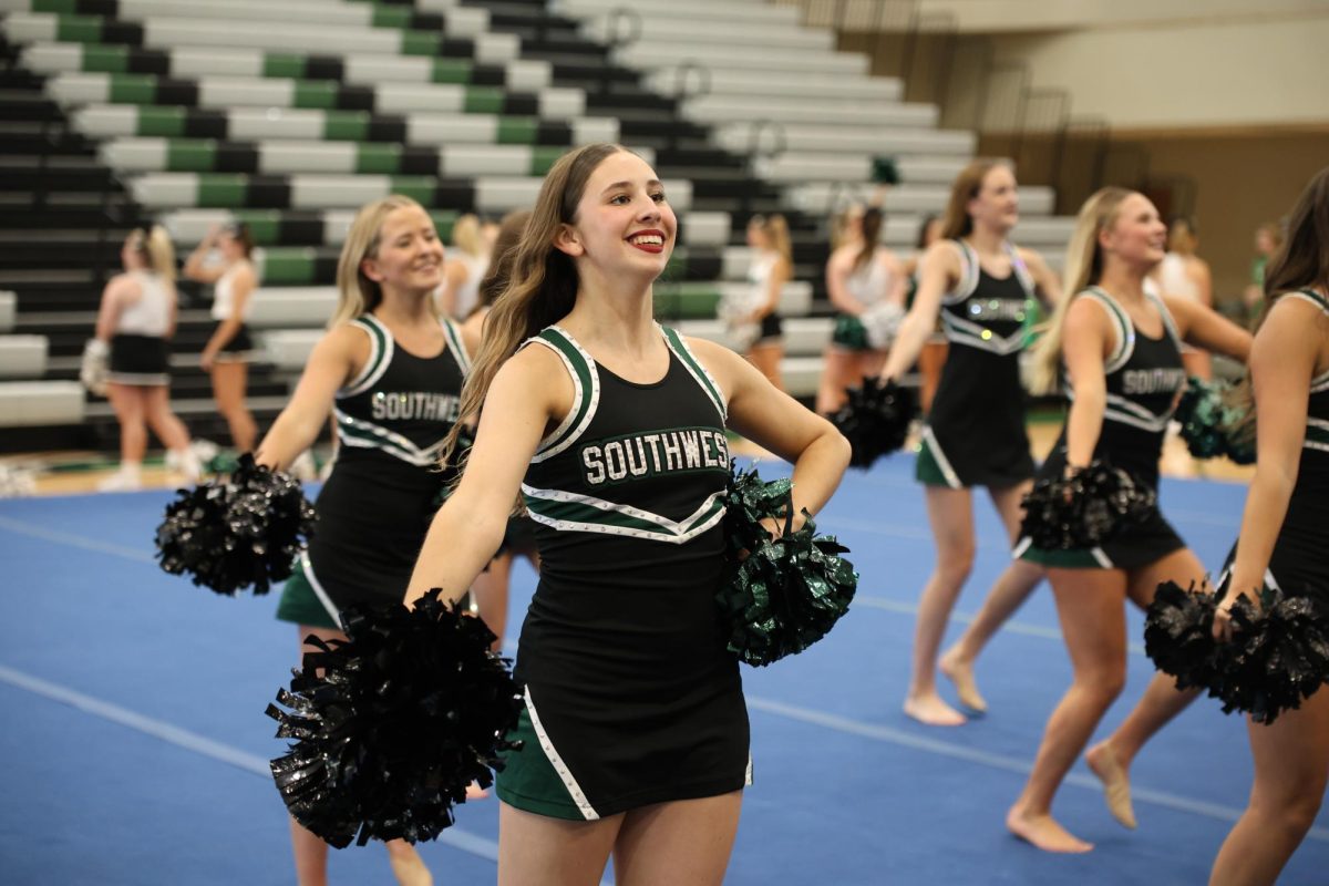 At the assembly on Sept. 12, junior Kailyn Worley dances to a routine as a member of the Glitter Girls.